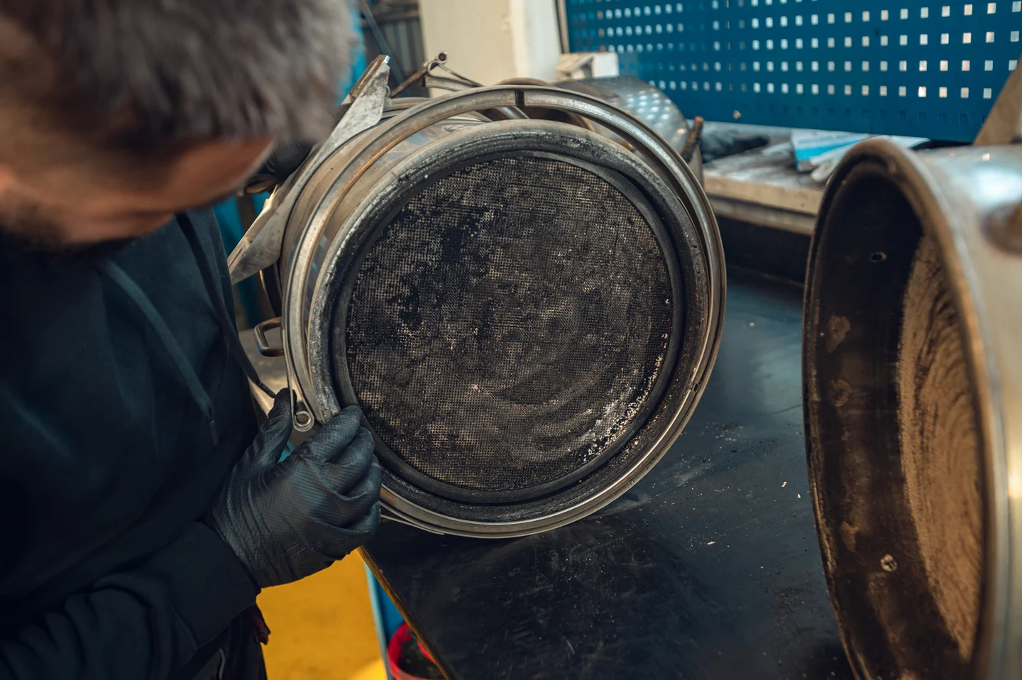 Maintenance of construction machinery exhaust system