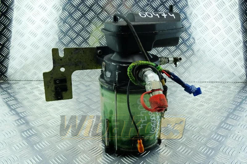 Central lubrication pump with grease reservoir for a Liebherr excavator