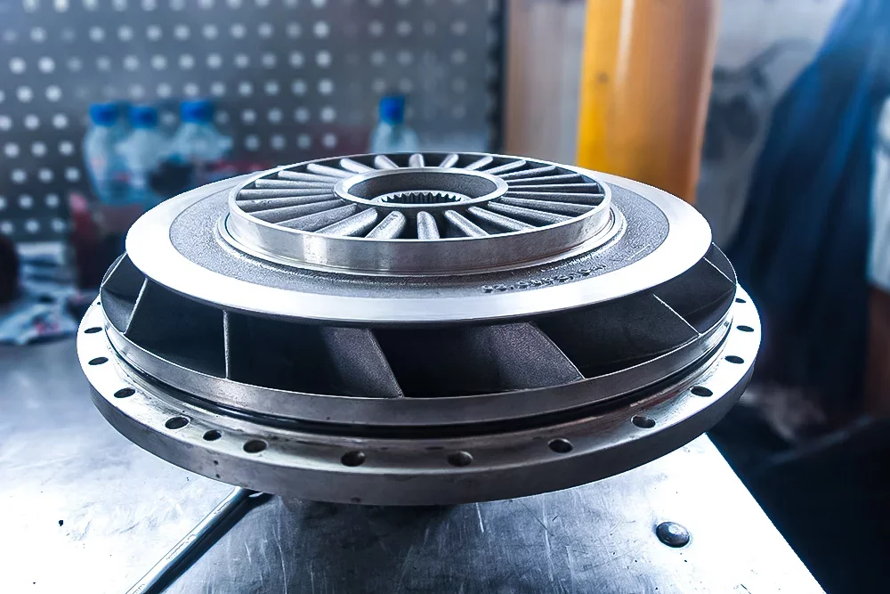 Construction machine torque converter on a workbench