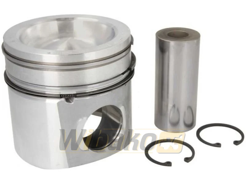Diesel engine piston with combustion bowl in the crown and piston ring grooves