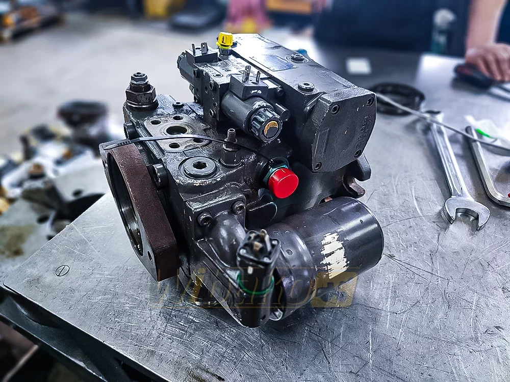 Axial piston hydraulic pump with regulator on a workshop bench