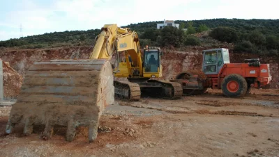 Welding and Bushing of Holes in Arms and Buckets